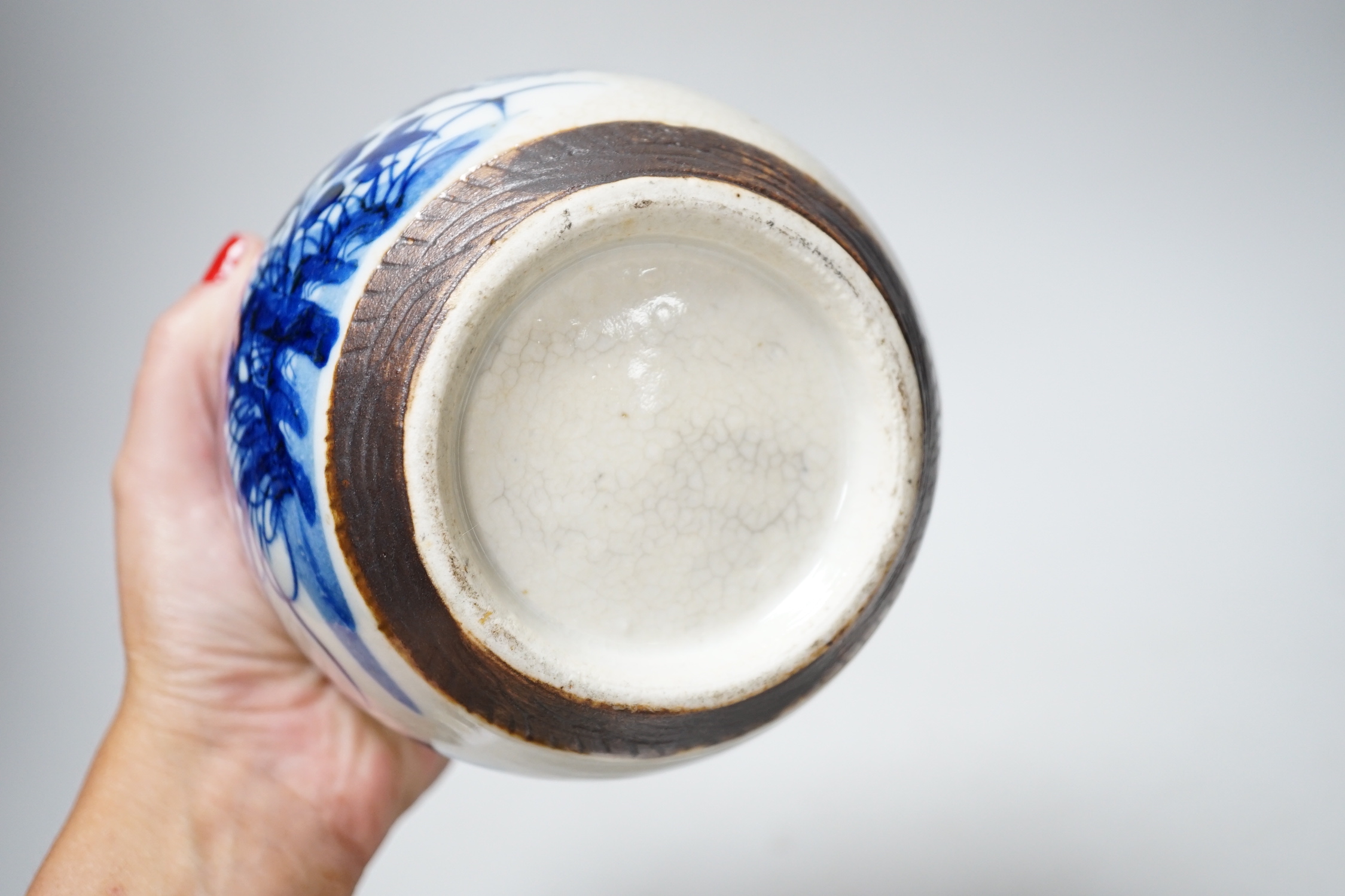 A Chinese famille rose plate, a cantonese plate and a blue and white crackle glaze jar